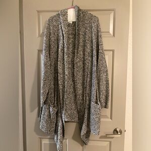 Plus size, 3x, oversized comfy cardigan with deep outside pockets